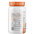 1kg white tub of Muscle Ooze Nutrition Loading Gainer dietary supplement in Malai Kulfi flavor. The front label features an orange and black logo, nutritional information highlighting 428 calories, 77g carbs, and 21g protein per serving, alongside a picture of a malai kulfi popsicle splashing into milk